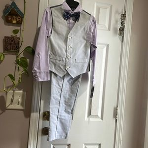New Light gray boy suit size 8 with purple checkerboard shirt and bow tie.